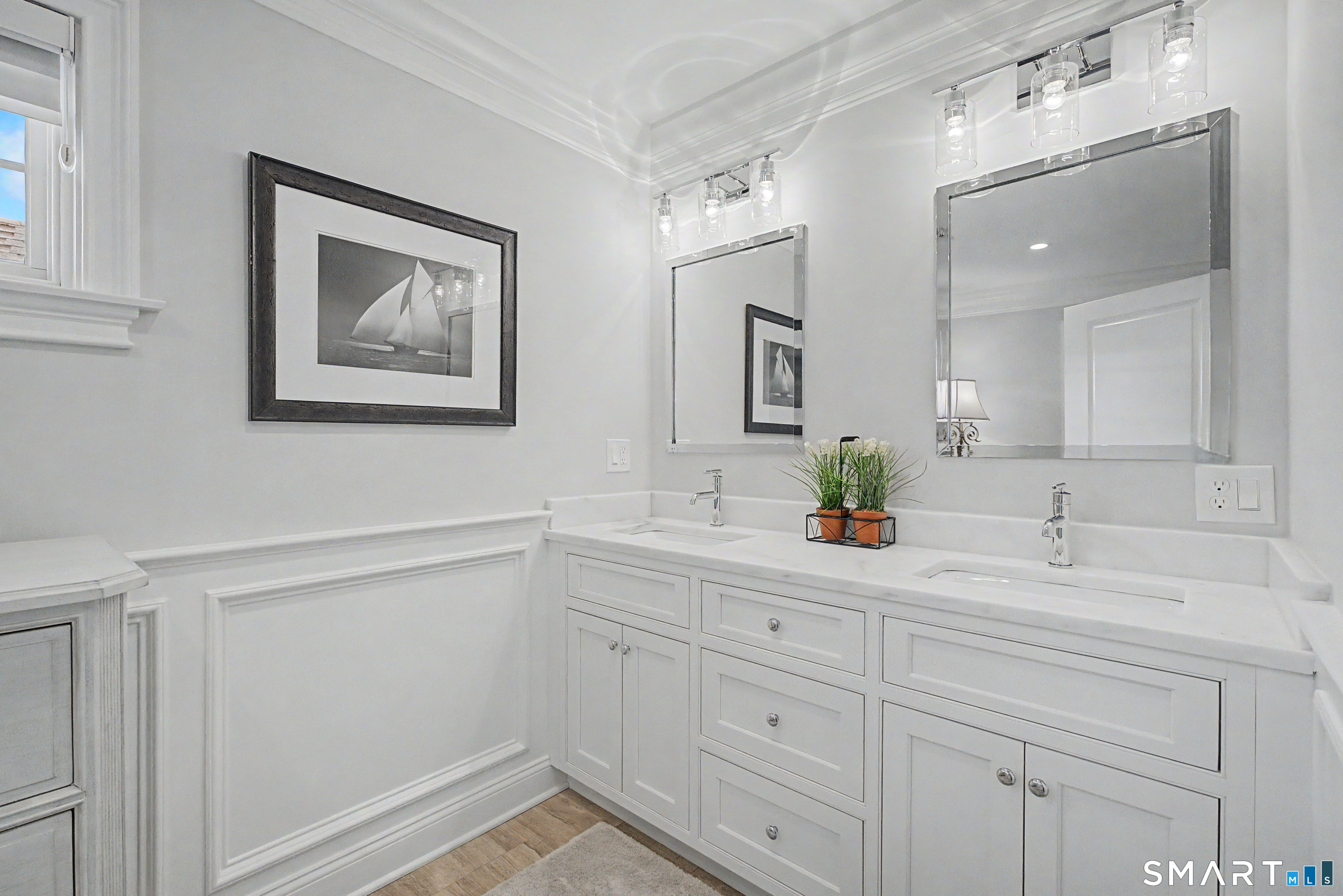 101 Garnet Park Road Madison, CT 06443 - Photo 27 of 40 a bathroom with a sink and a mirror