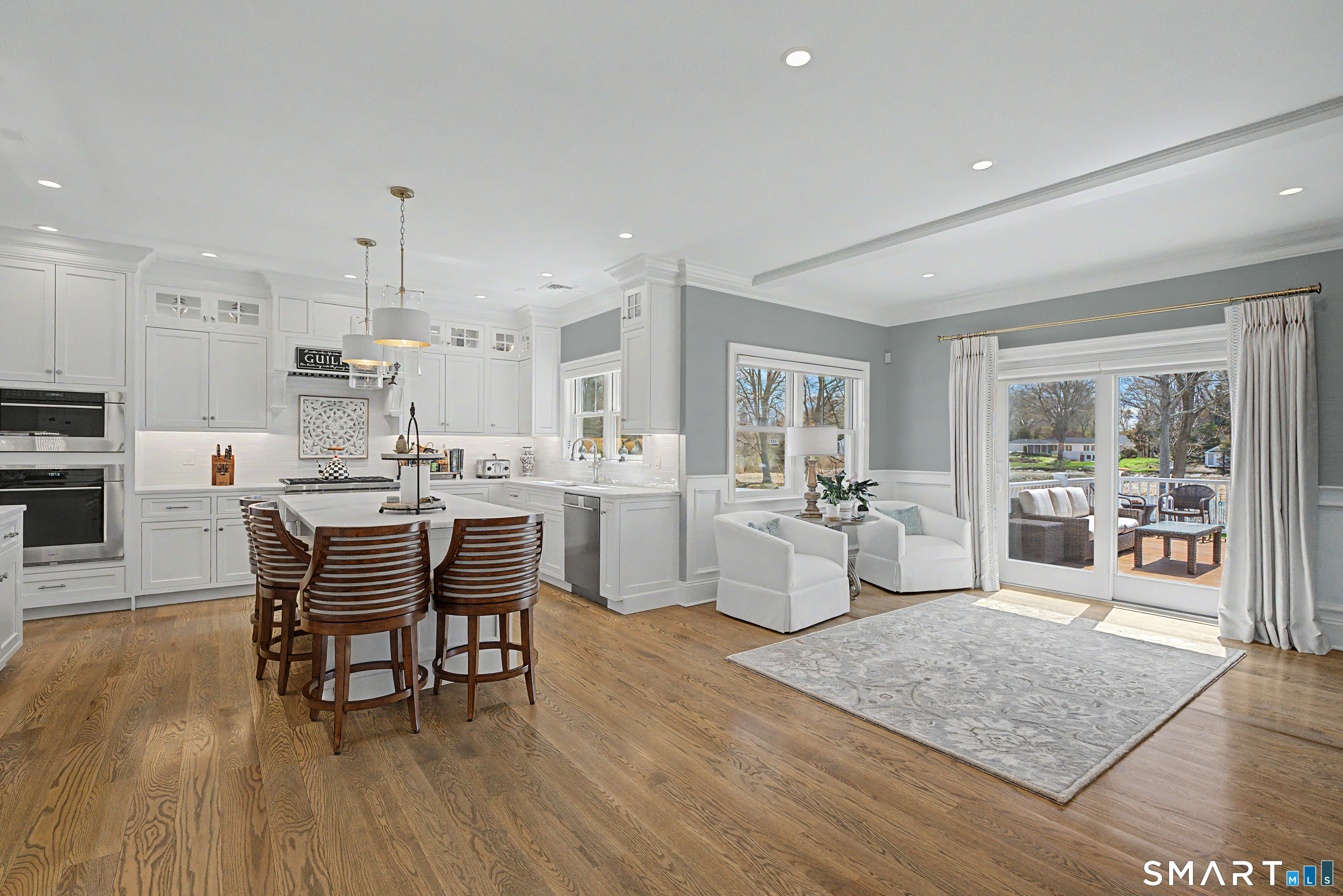 101 Garnet Park Road Madison, CT 06443 - Photo 6 of 40 a large kitchen with cabinets table and chairs