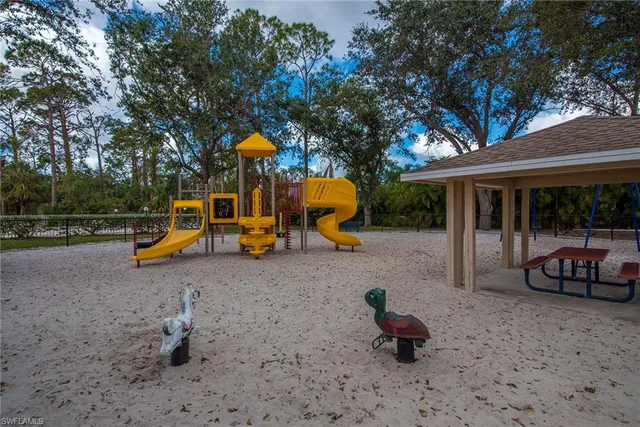 a front view of house and yard with green space
