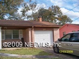 6049 Ricker Road Jacksonville, FL 32244 - Photo 1 of 12 a view of a car park in front of a building