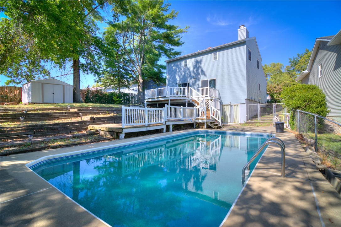 2231 West Packard Street Decatur, IL 62522 - Photo 2 of 39 a view of a swimming pool with a patio