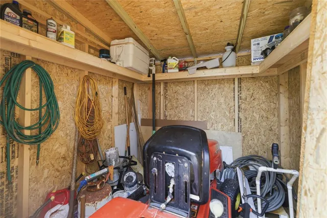 a view of a balcony with furniture