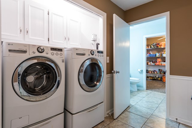 6815 Cartledge Road Box Springs, GA 31801 - Photo 19 of 27 a utility room with dryer and washer