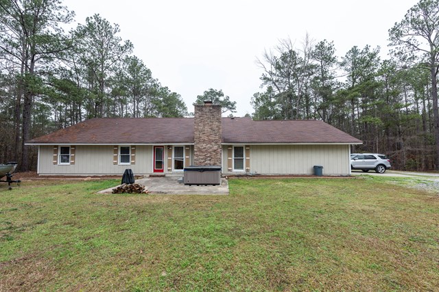 6815 Cartledge Road Box Springs, GA 31801 - Photo 24 of 27 a house view with a garden space
