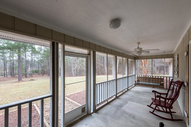 6815 Cartledge Road Box Springs, GA 31801 - Photo 25 of 27 a view of a room with furniture and balcony