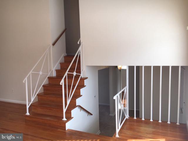 5923 Halpine Road Rockville, MD 20851 - Photo 13 of 23 Stairs to bedroom level and foyer