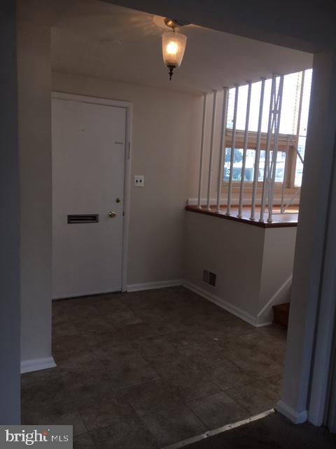 5923 Halpine Road Rockville, MD 20851 - Photo 5 of 23 Foyer with ceramic tile