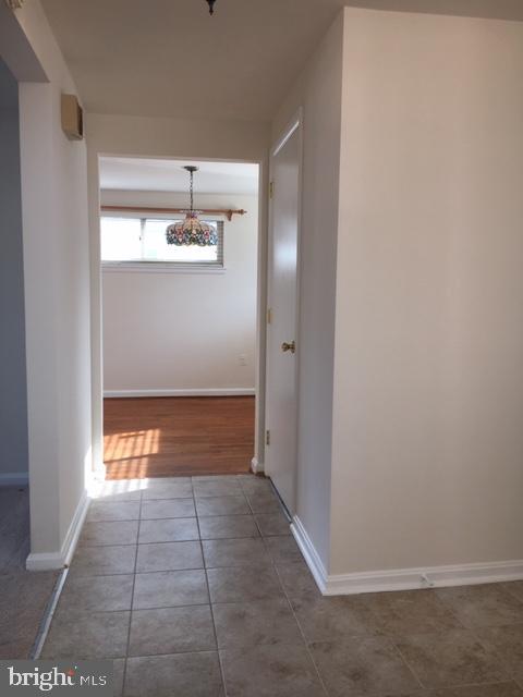 5923 Halpine Road Rockville, MD 20851 - Photo 6 of 23 Foyer looking towards dining room and powder room