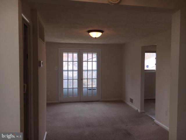 5923 Halpine Road Rockville, MD 20851 - Photo 7 of 23 View from foyer to family room
