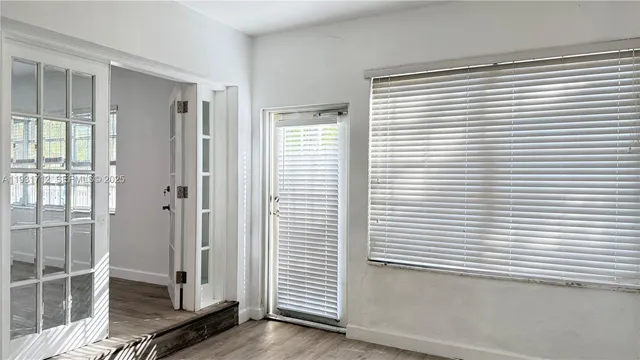 a view of a room that has a window in it