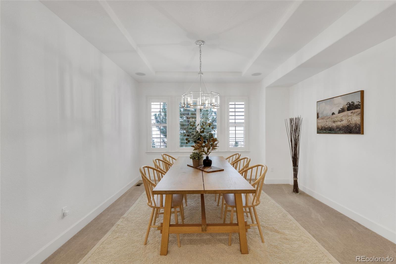 10632 Star Thistle Court Highlands Ranch, CO 80126 - Photo 13 of 50 a dining room with furniture and window