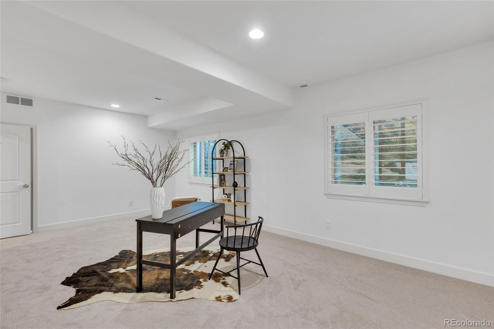10632 Star Thistle Court Highlands Ranch, CO 80126 - Photo 33 of 50 a view of a livingroom with furniture and a window