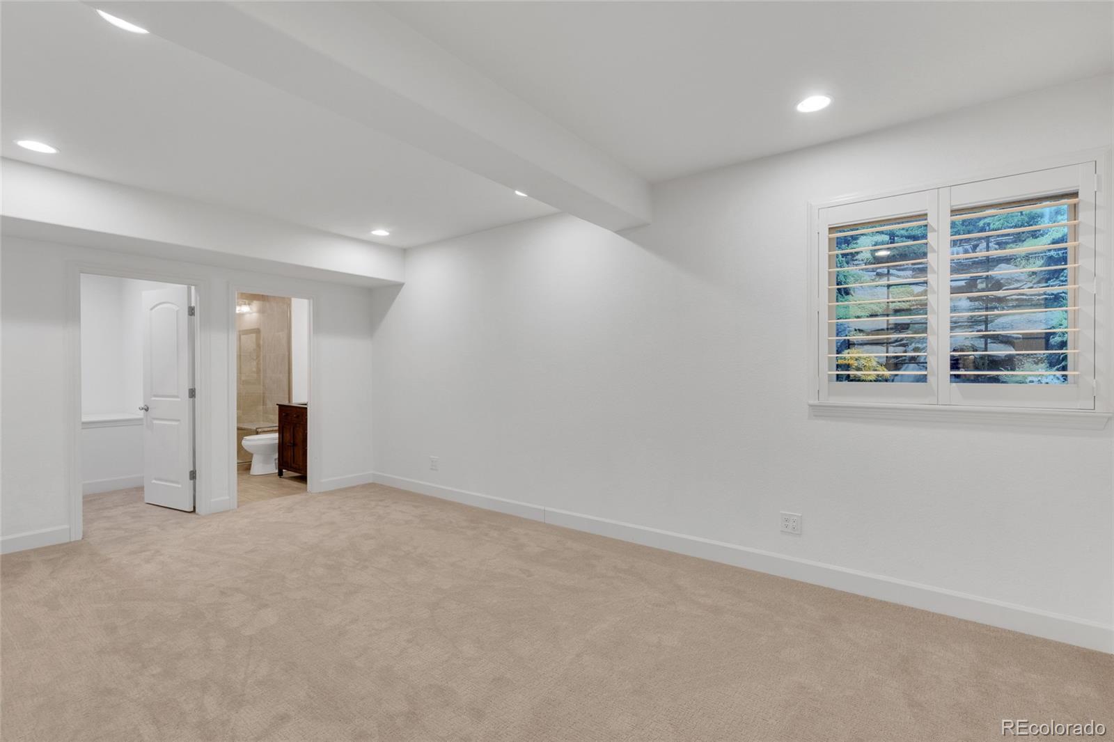 10632 Star Thistle Court Highlands Ranch, CO 80126 - Photo 34 of 50 a view of an empty room with a window