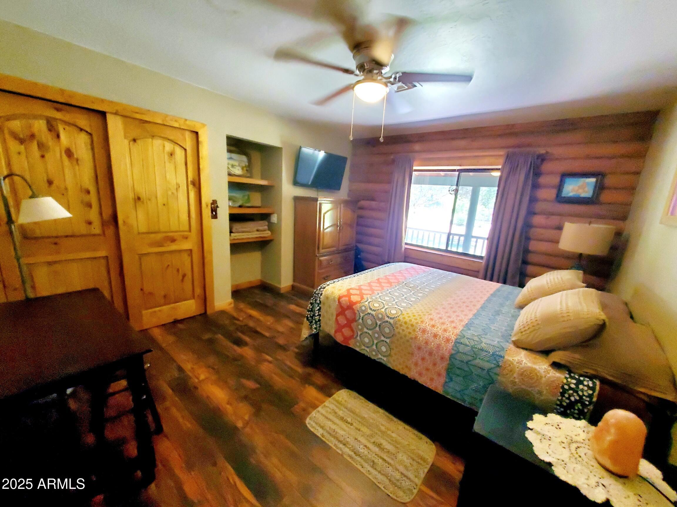 367 River Road Payson, AZ 85541 - Photo 20 of 44 a bedroom with a bed dresser and a window