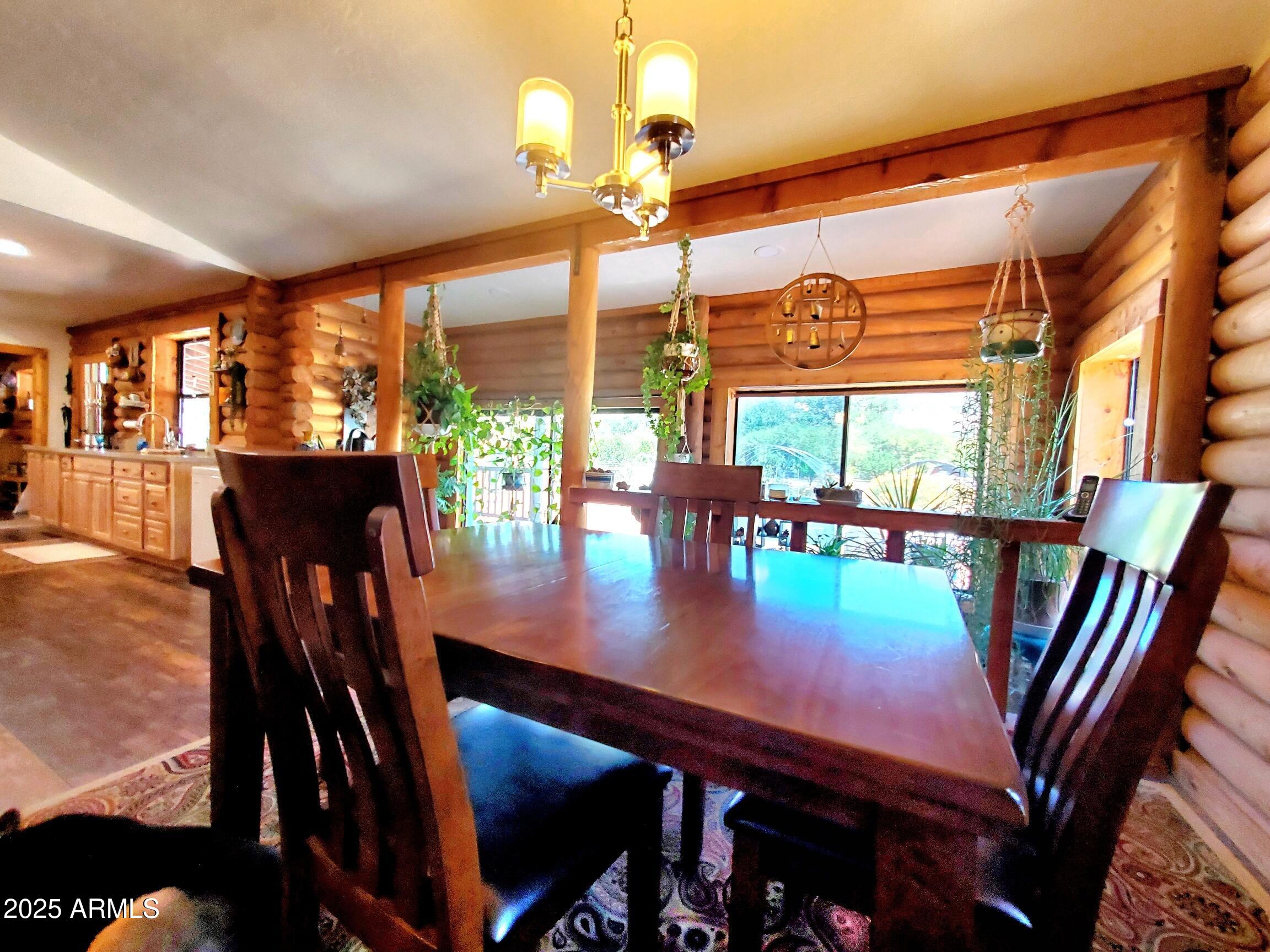 367 River Road Payson, AZ 85541 - Photo 28 of 44 a view of a dining room with furniture window and outside view