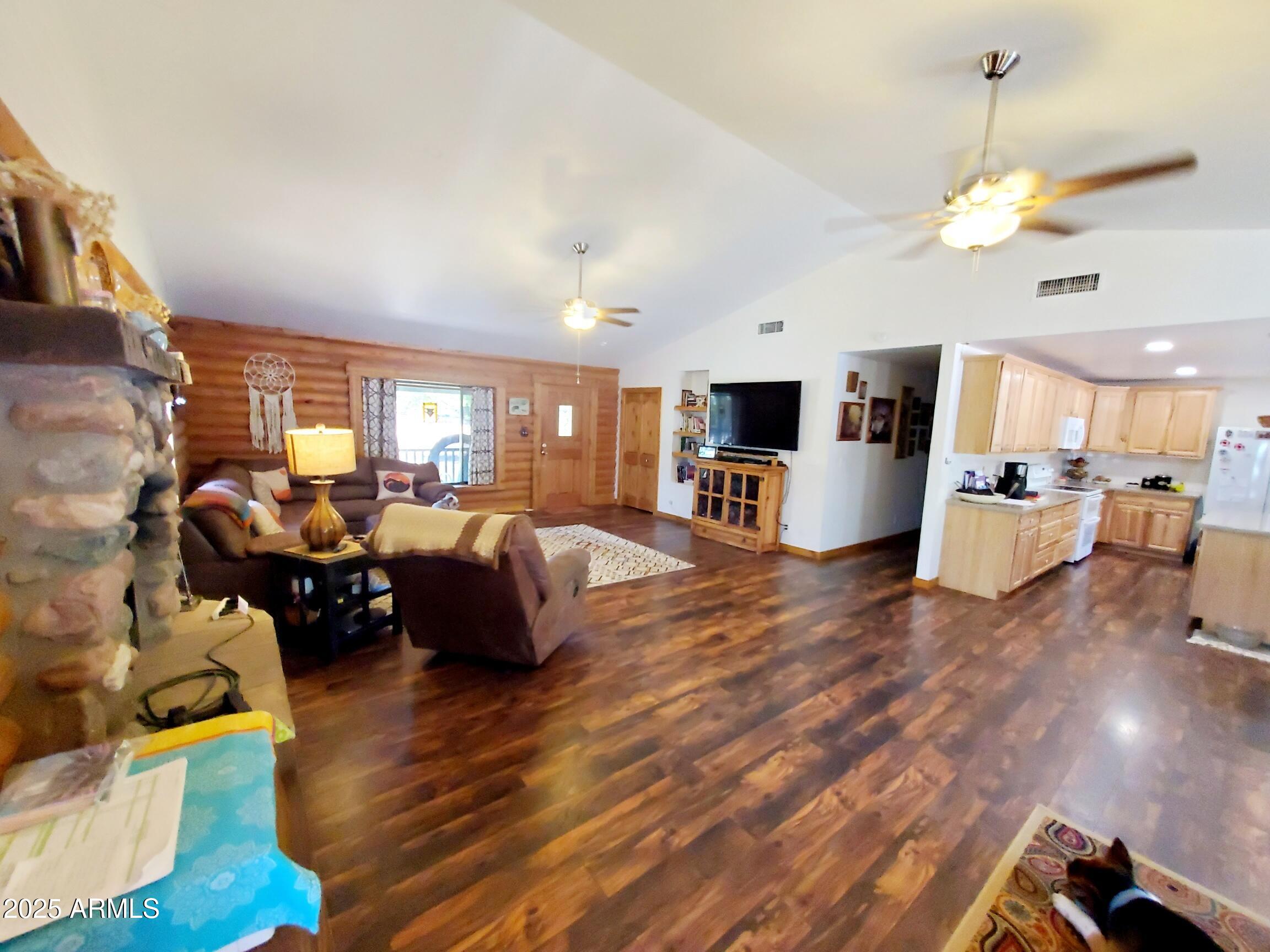 367 River Road Payson, AZ 85541 - Photo 29 of 44 a living room with furniture and a chandelier