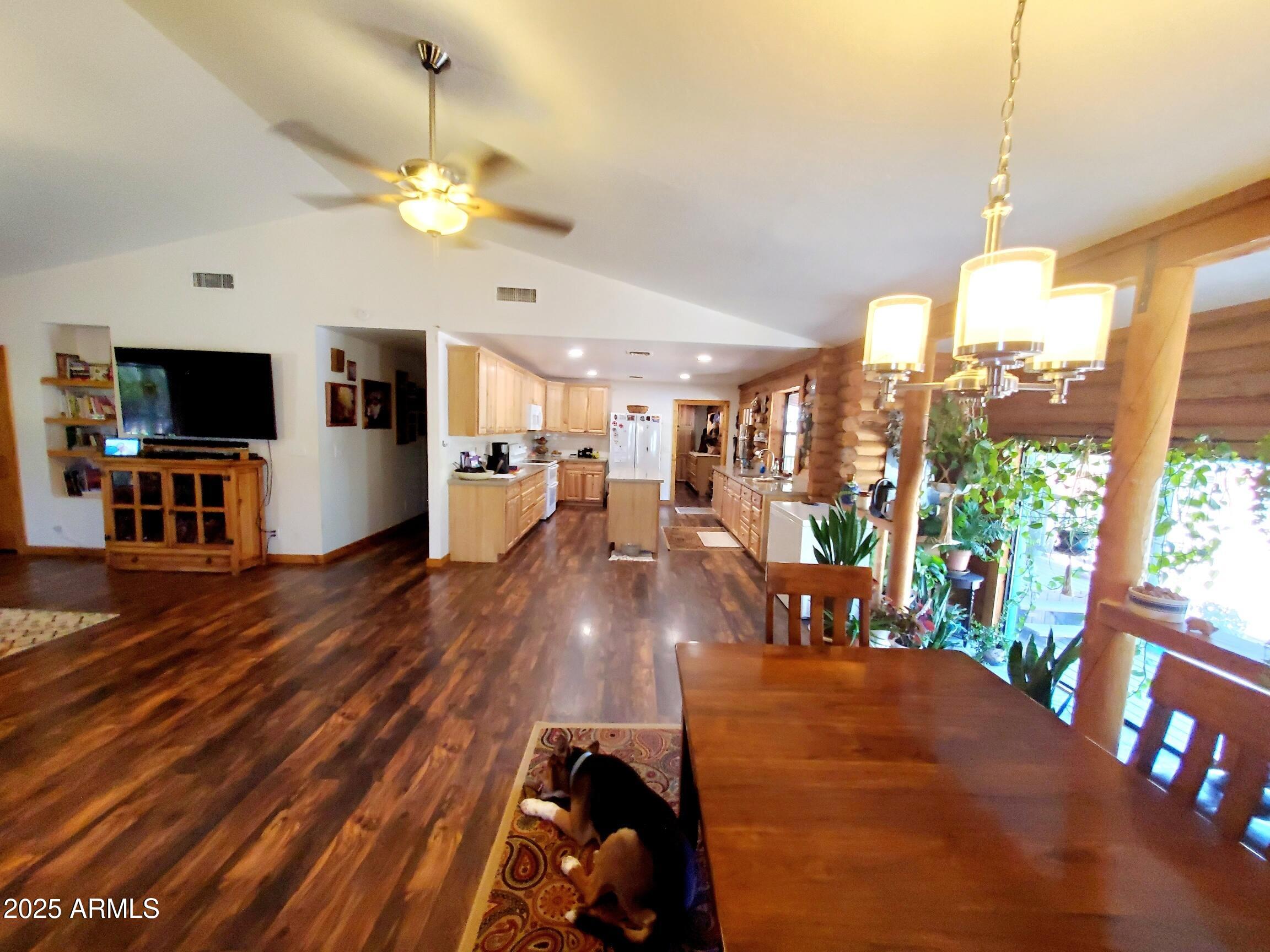 367 River Road Payson, AZ 85541 - Photo 30 of 44 a very nice looking living room with a large window a flat screen tv and outdoor space