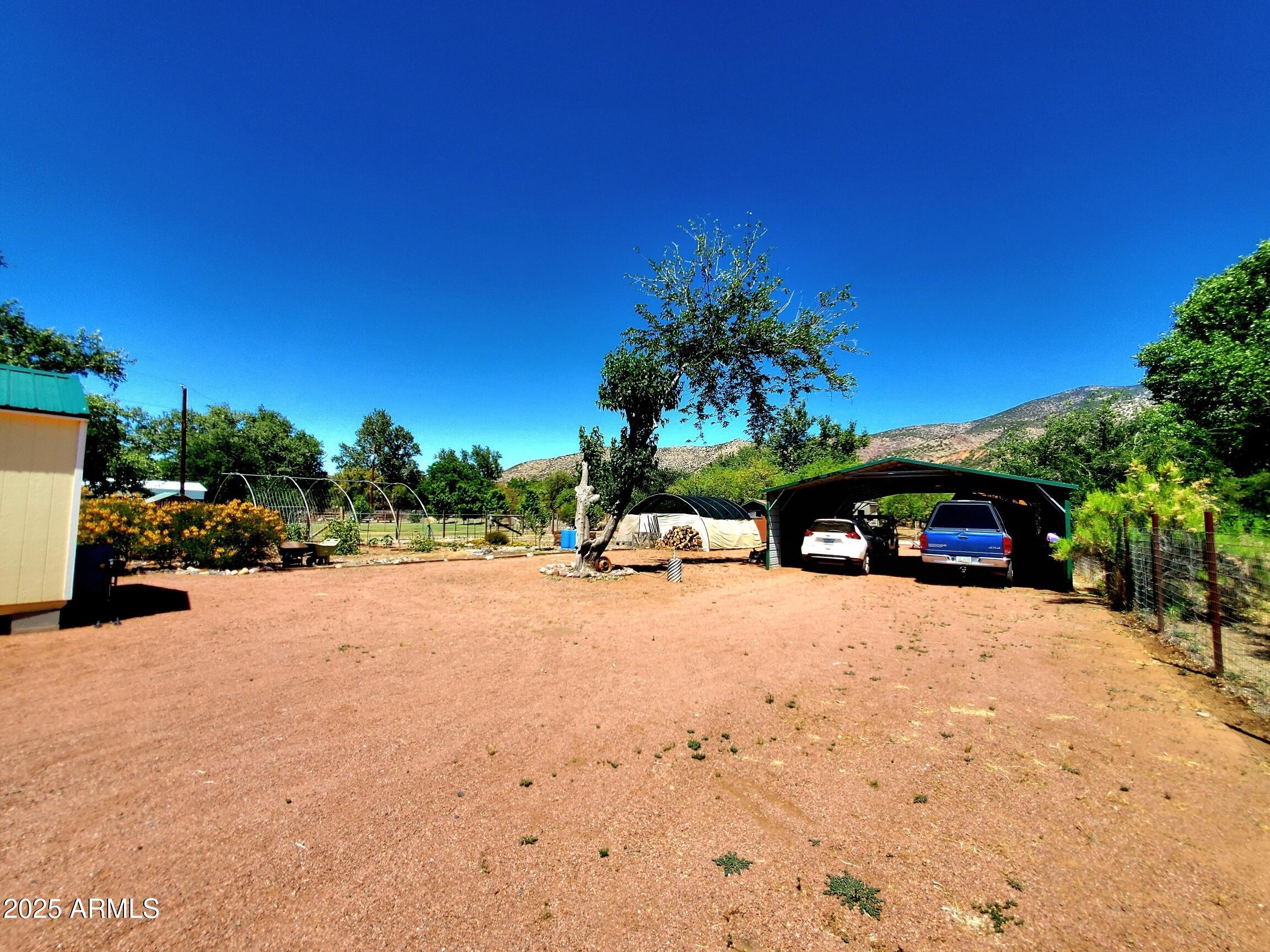 367 River Road Payson, AZ 85541 - Photo 6 of 44 a street view with a building in the background