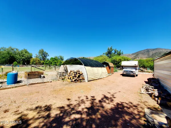 a view of a terrace with chairs