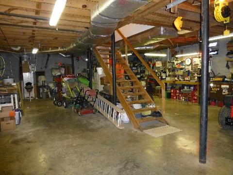 1666 Council Bend Road Centerville, TN 37033 - Photo 12 of 18 Great workshop area in the basement/garage! Also has a wood burning stove and it's plumbed for a 3rd bath!