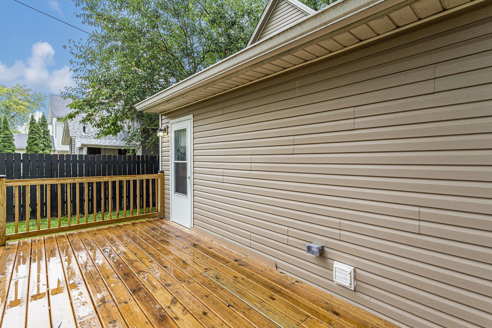 2522 5th Avenue Moline, IL 61265 - Photo 3 of 6 a view of a wooden balcony