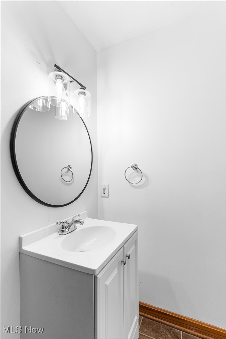 4075 Kirk Road Austintown, OH 44511 - Photo 22 of 40 Bathroom with vanity and baseboards