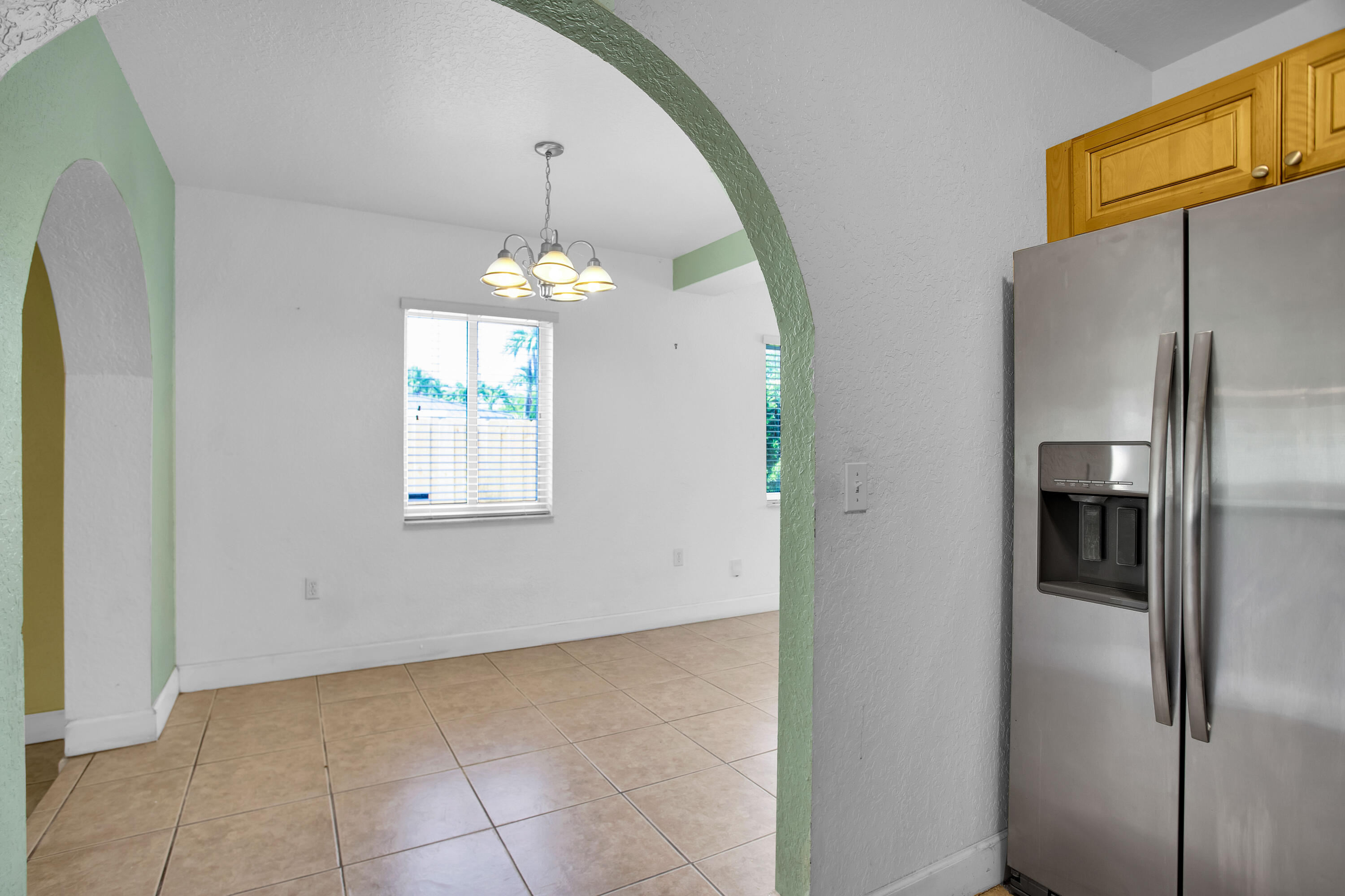 424 Southwest 64th Court Miami, FL 33144 - Photo 15 of 44 a view of a kitchen with a refrigerator cabinet a sink and dishwasher