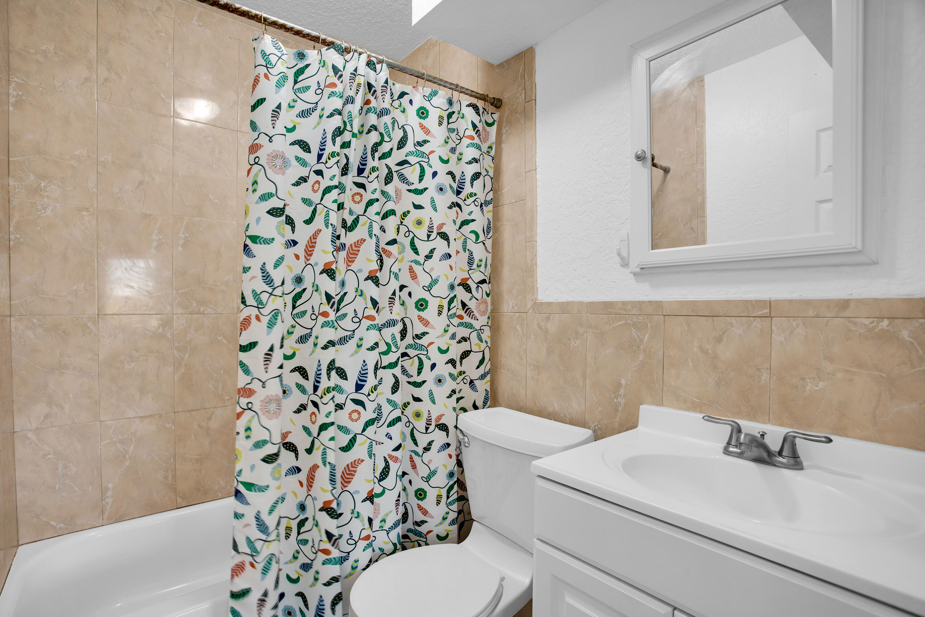 424 Southwest 64th Court Miami, FL 33144 - Photo 23 of 44 a bathroom with a sink toilet and shower