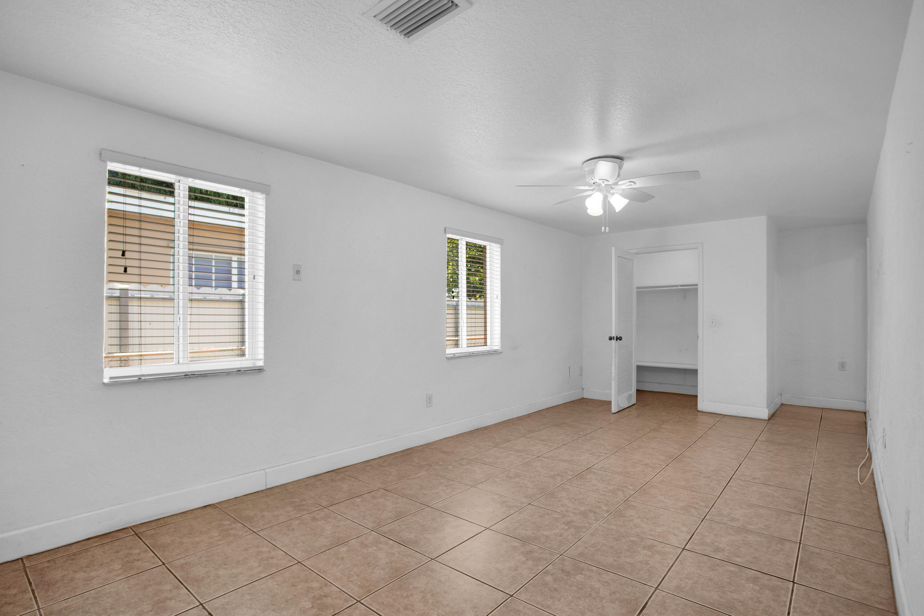 424 Southwest 64th Court Miami, FL 33144 - Photo 26 of 44 a view of an empty room with a window