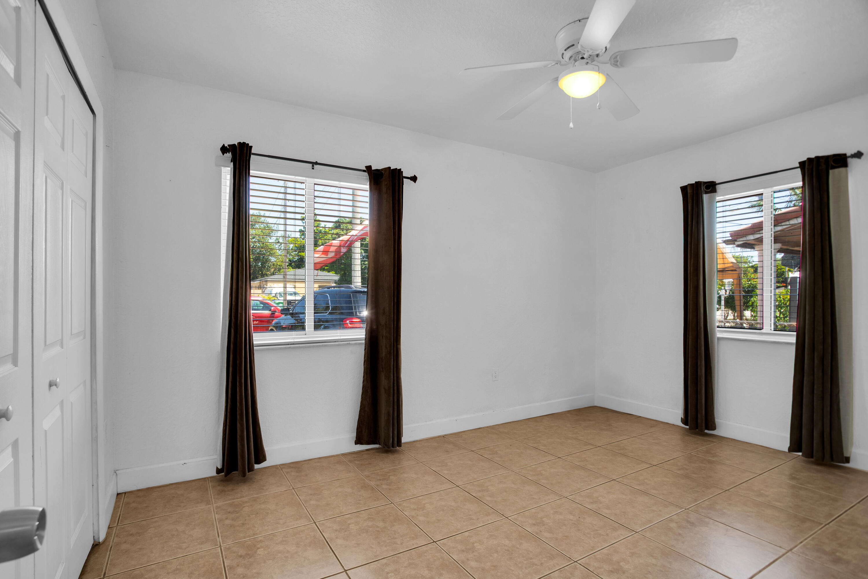 424 Southwest 64th Court Miami, FL 33144 - Photo 36 of 44 a view of an empty room with window and refrigerator