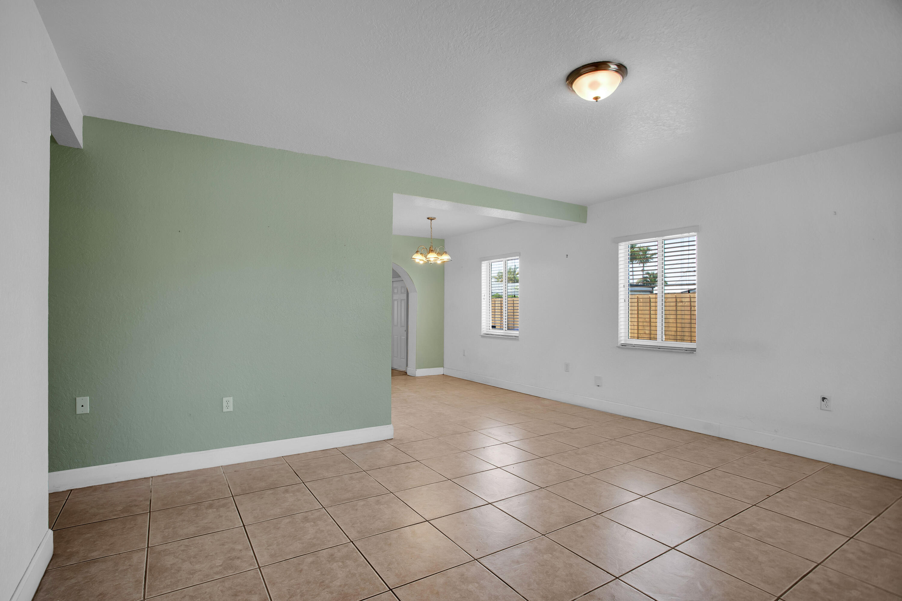 424 Southwest 64th Court Miami, FL 33144 - Photo 5 of 44 an empty room with windows