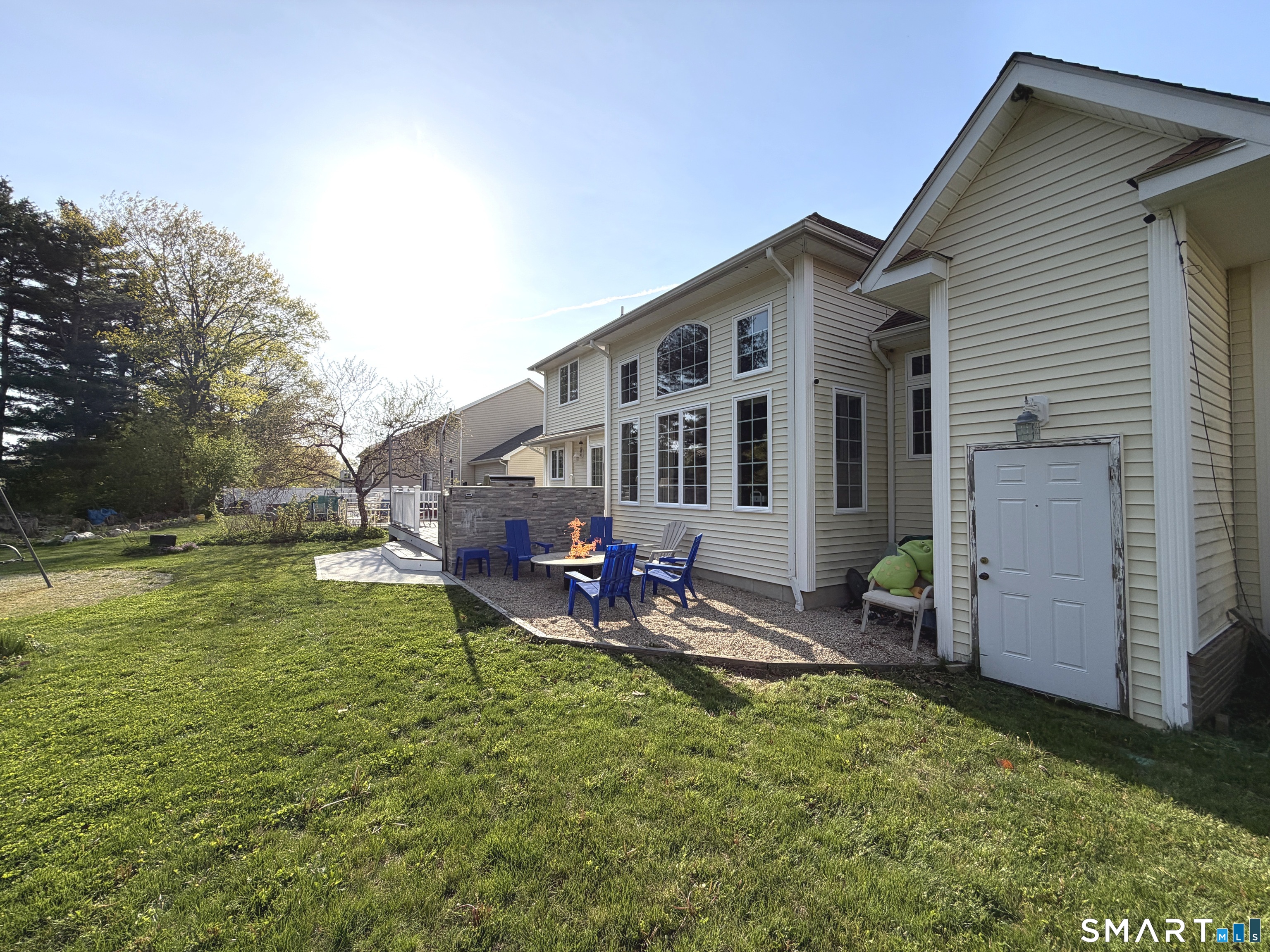 35 Emerald Pines Road Waterbury, CT 06704 - Photo 13 of 40 a view of a house with backyard porch and sitting area