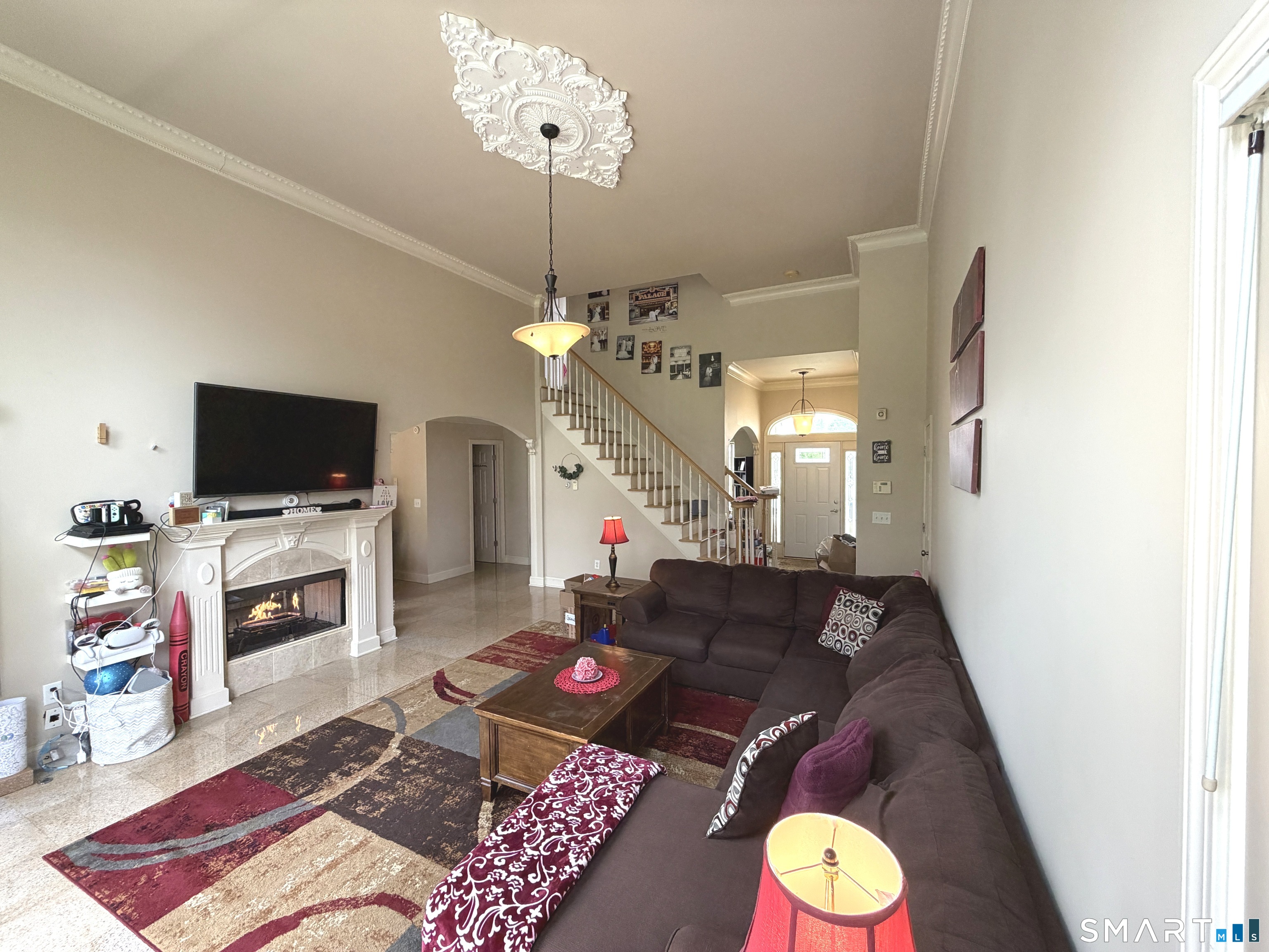 35 Emerald Pines Road Waterbury, CT 06704 - Photo 22 of 40 a living room with furniture and a flat screen tv