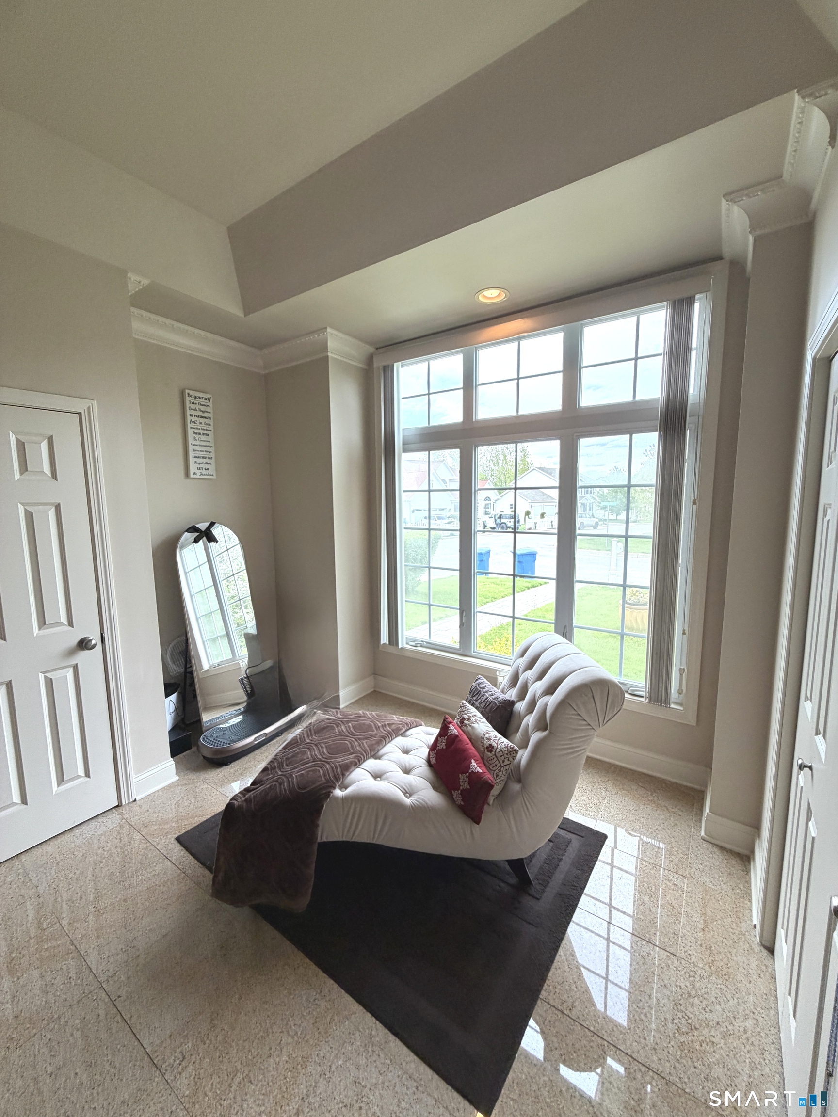 35 Emerald Pines Road Waterbury, CT 06704 - Photo 26 of 40 a living room with furniture and a large window