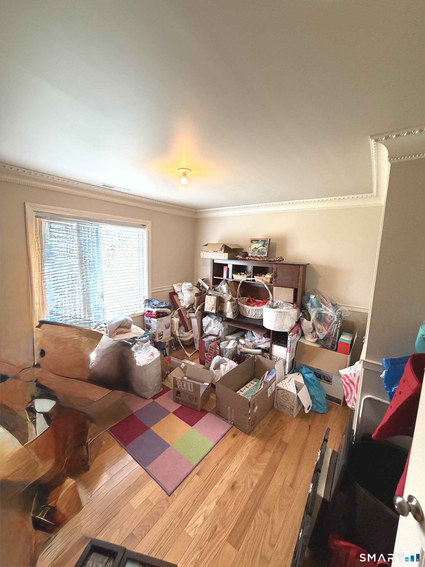 35 Emerald Pines Road Waterbury, CT 06704 - Photo 38 of 40 a room with furniture and a large window