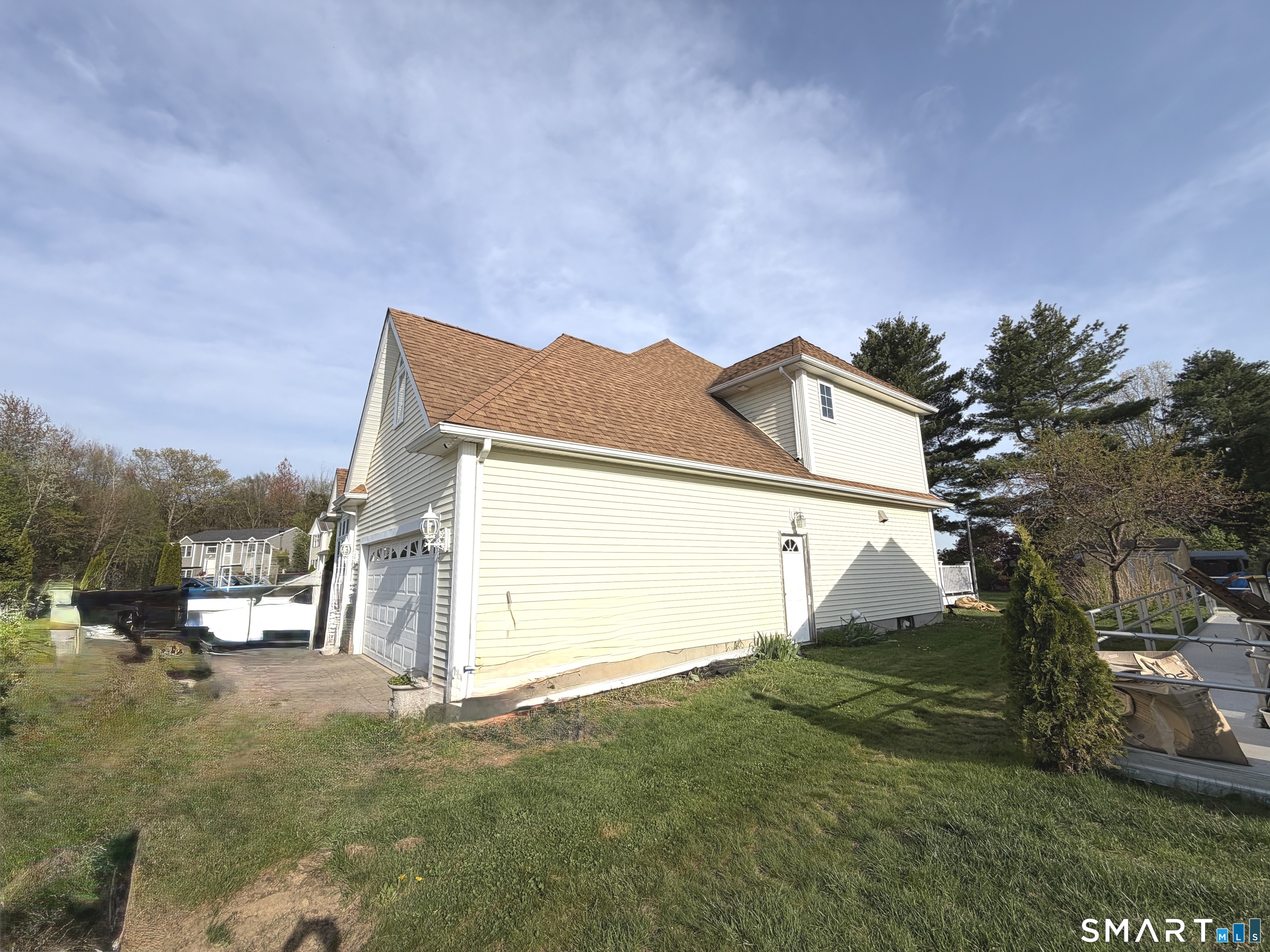 35 Emerald Pines Road Waterbury, CT 06704 - Photo 5 of 40 a view of a house with a yard