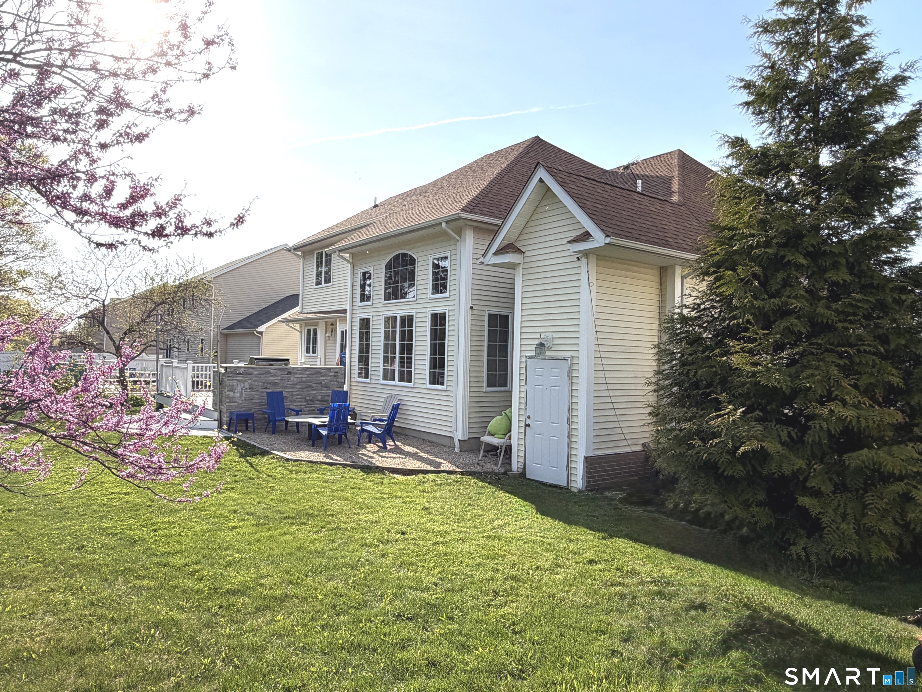 35 Emerald Pines Road Waterbury, CT 06704 - Photo 6 of 40 a view of a house with a yard and sitting area