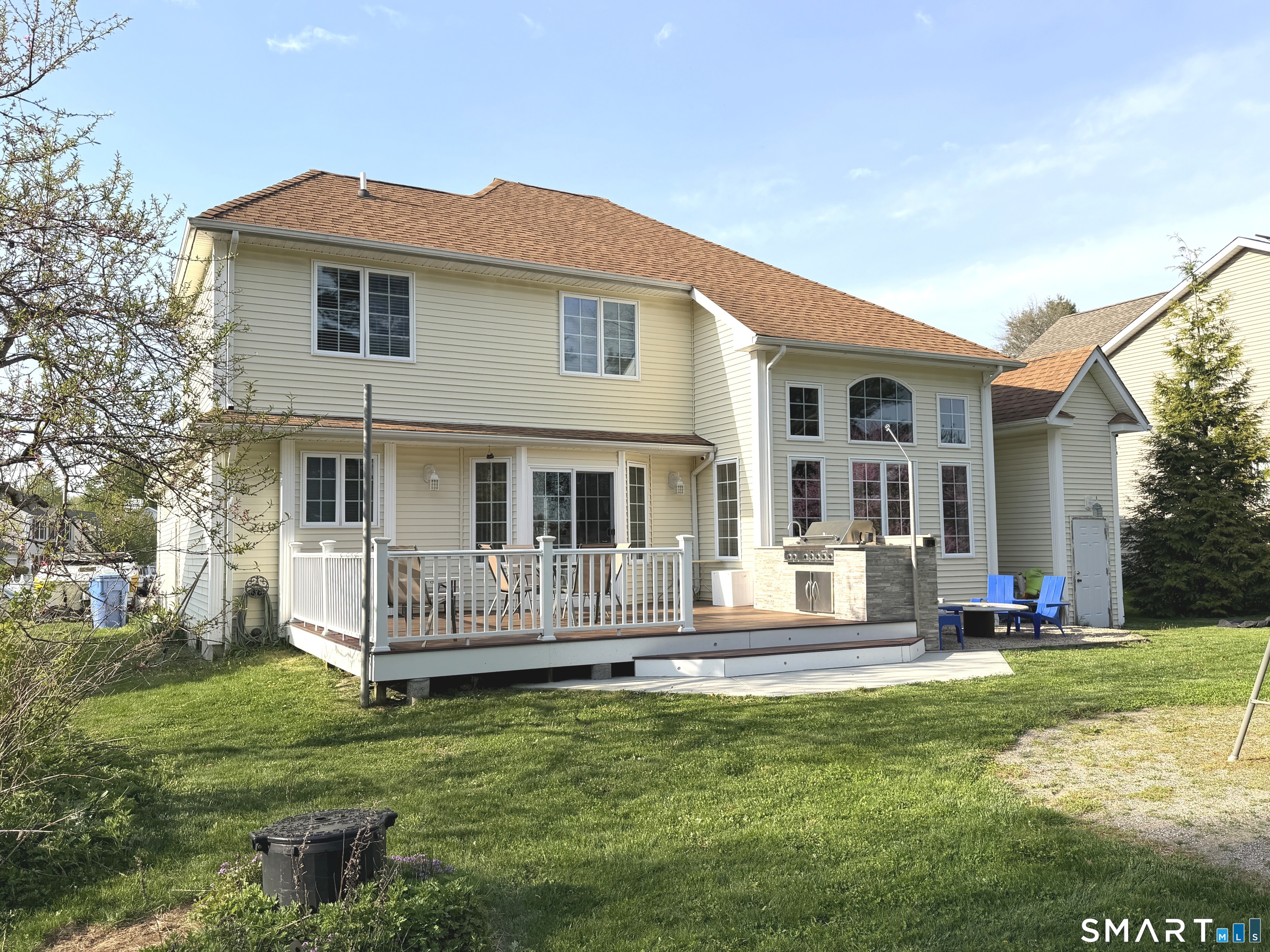 35 Emerald Pines Road Waterbury, CT 06704 - Photo 8 of 40 a front view of a house with a yard