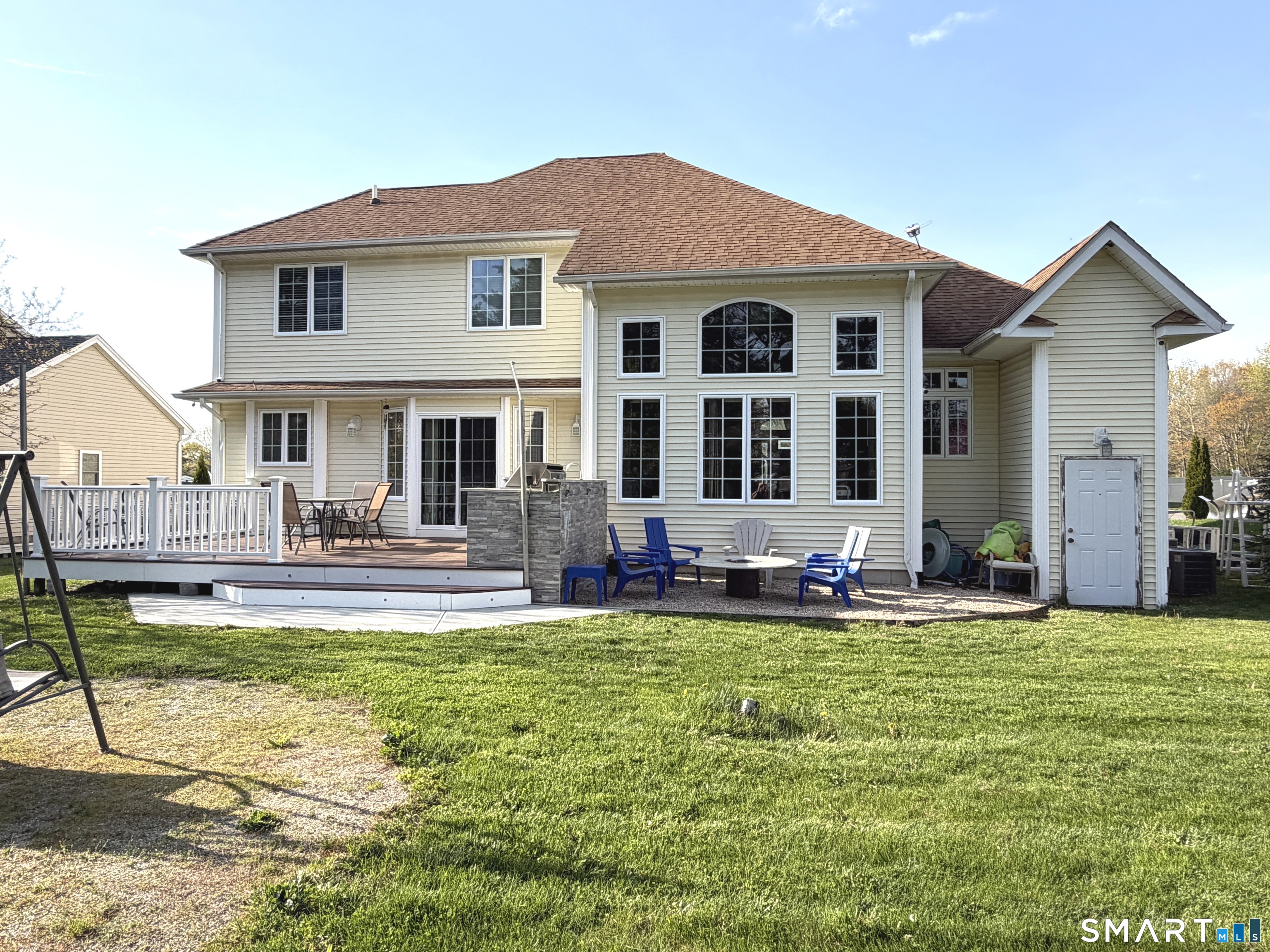35 Emerald Pines Road Waterbury, CT 06704 - Photo 10 of 40 a view of a house with a patio and a yard