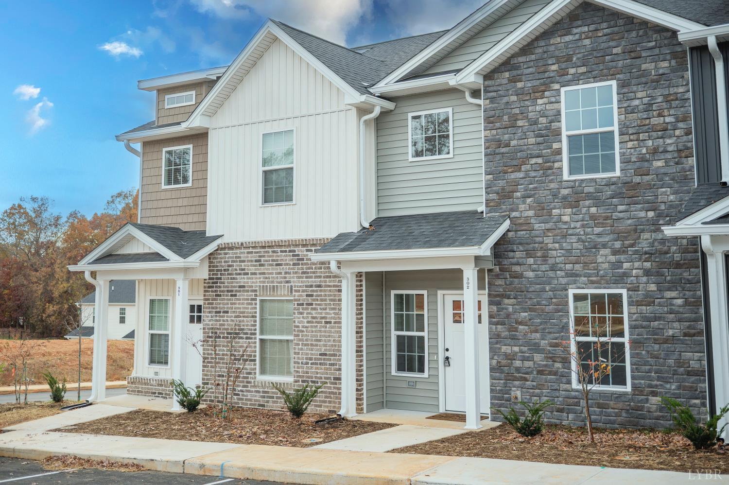 536 Leesville Road, Unit 306 Lynchburg, VA 24502 - Photo 1 of 48 a front view of a house with a yard