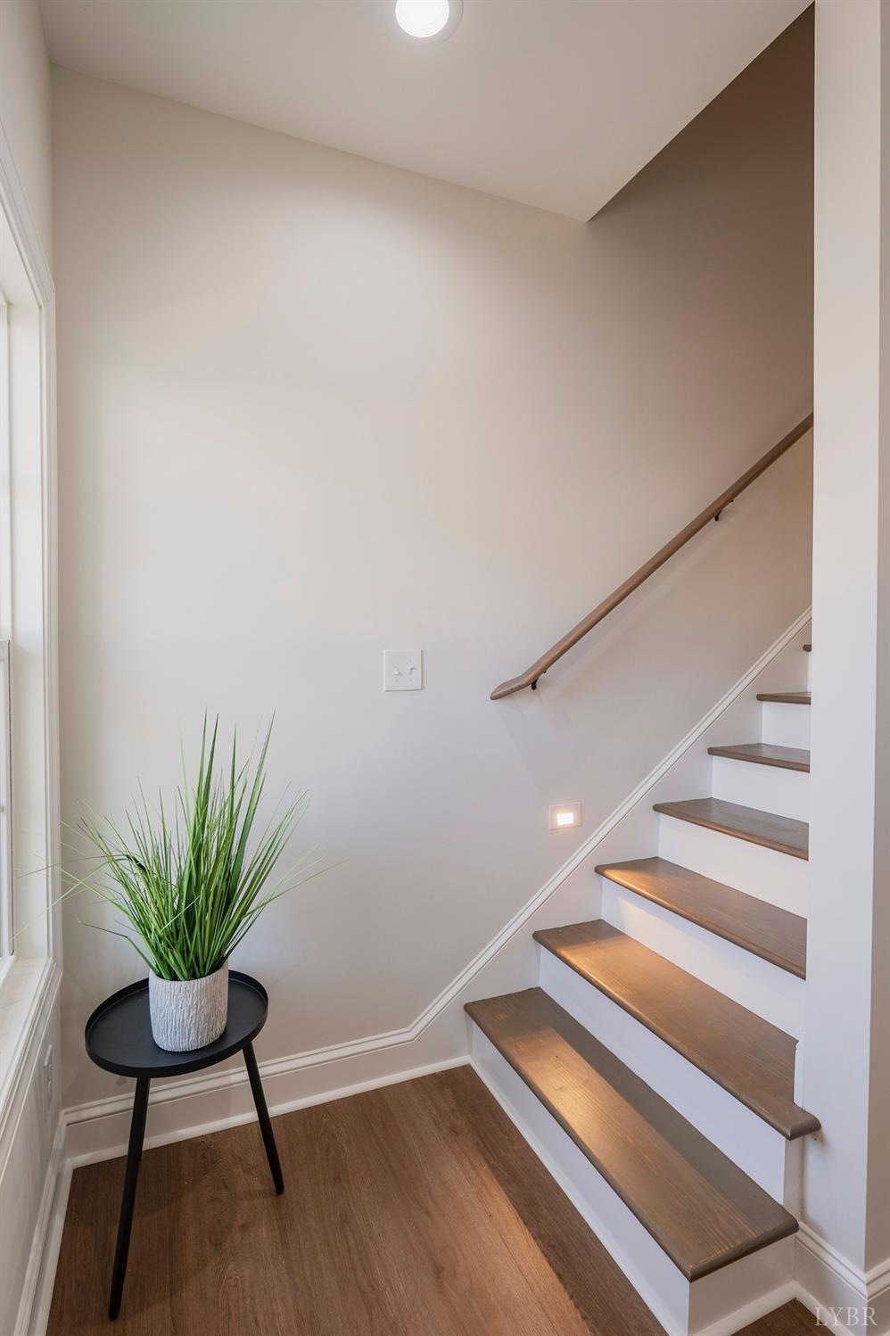 536 Leesville Road, Unit 306 Lynchburg, VA 24502 - Photo 17 of 48 a view of a room with wooden floor and potted plants