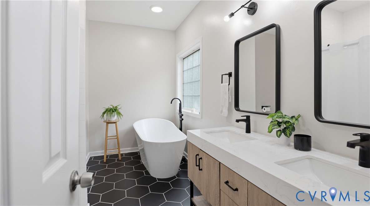 2406 Emanuel Church Road Powhatan, VA 23139 - Photo 25 of 48 Bathroom featuring a freestanding soaking tub, hex