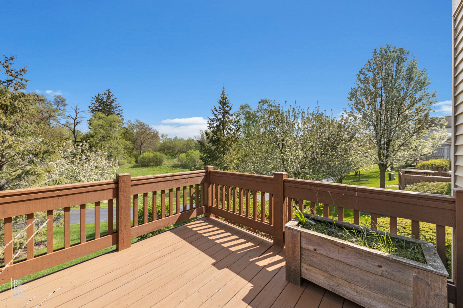 6400 Cunningham Court Gurnee, IL 60031 - Photo 18 of 19 a view of wooden deck with a chair
