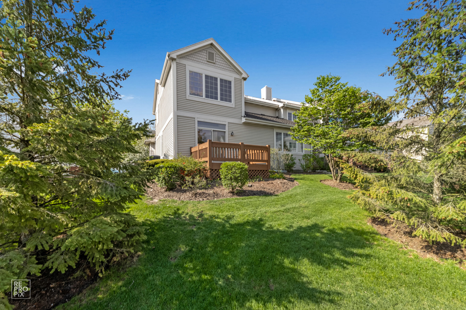 6400 Cunningham Court Gurnee, IL 60031 - Photo 19 of 19 a front view of a house with a yard