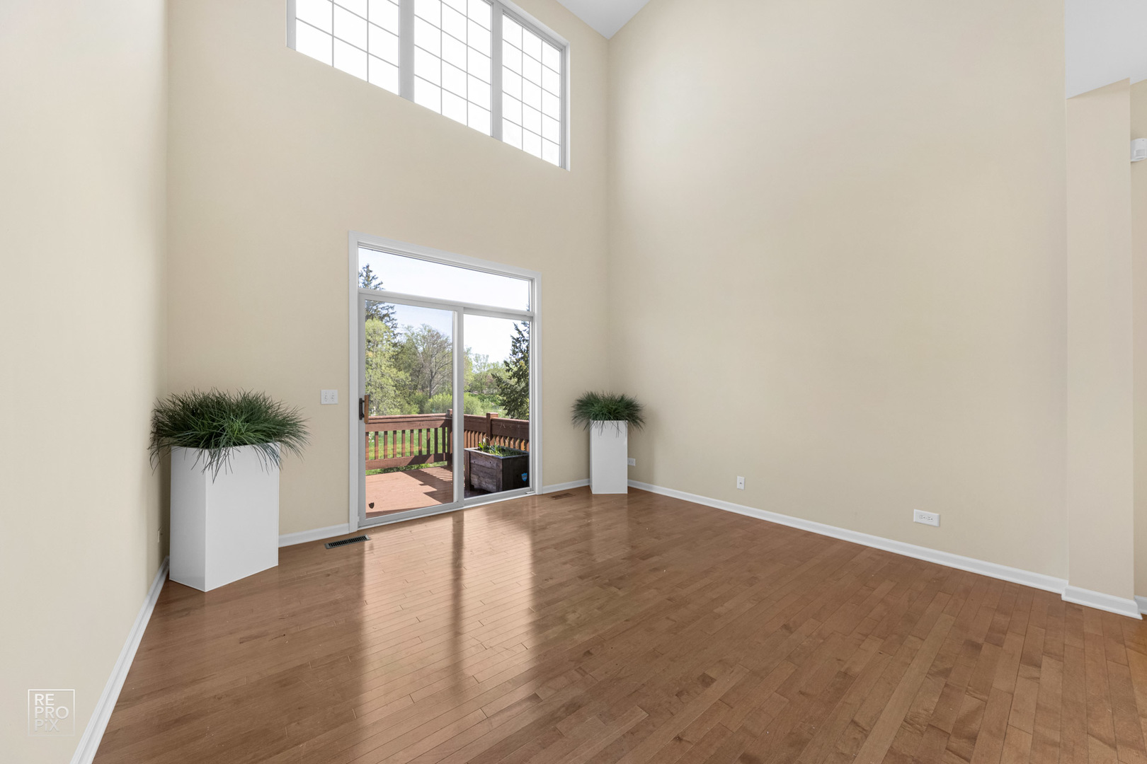 6400 Cunningham Court Gurnee, IL 60031 - Photo 4 of 19 a view of an empty room with a window