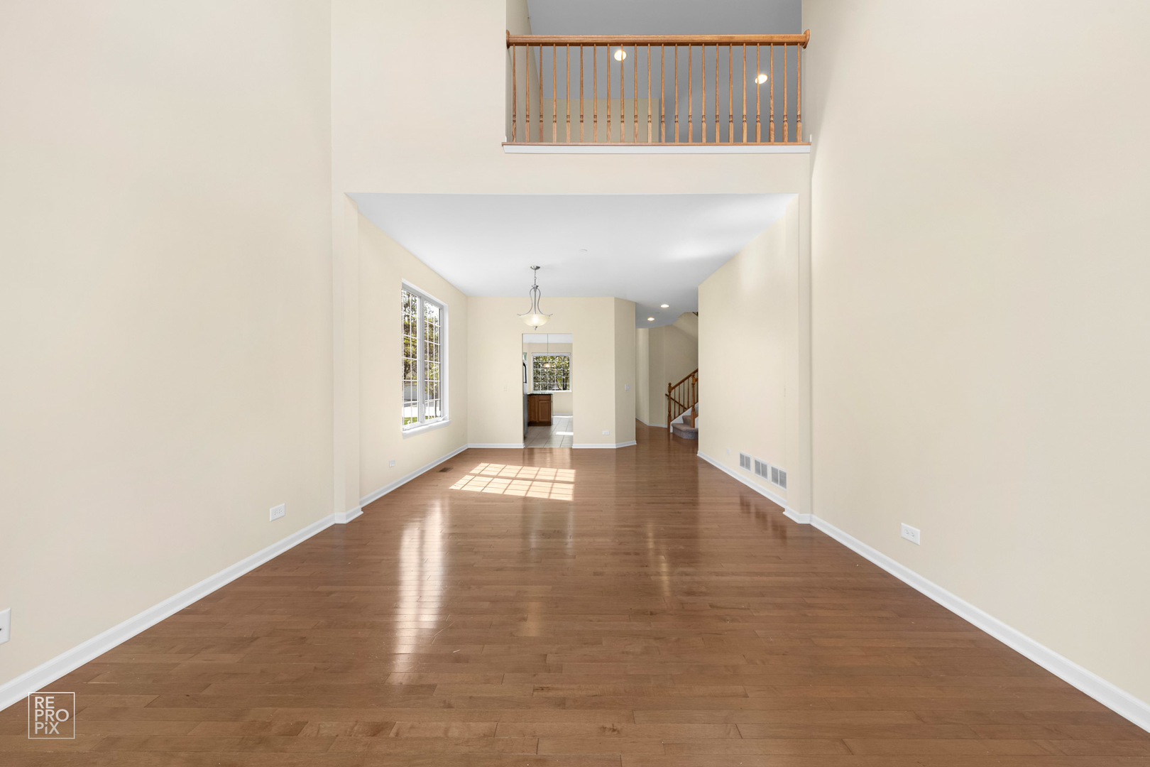 6400 Cunningham Court Gurnee, IL 60031 - Photo 5 of 19 a view of an empty room with wooden floor