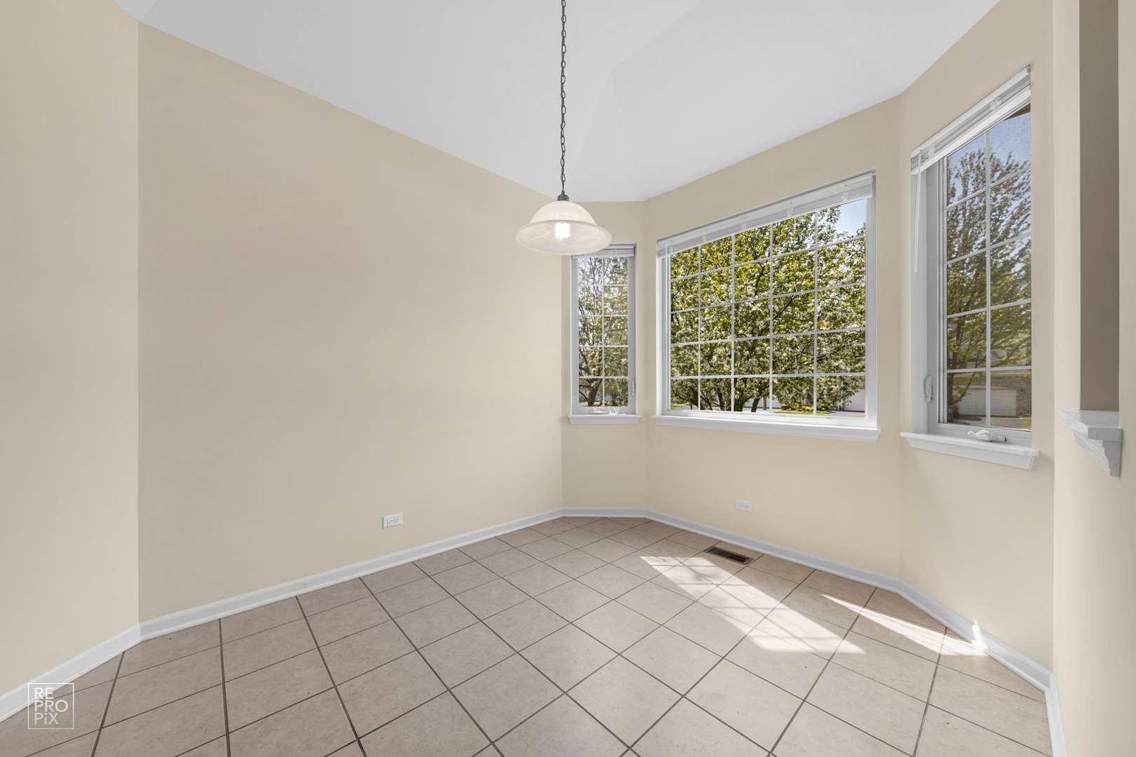 6400 Cunningham Court Gurnee, IL 60031 - Photo 9 of 19 a view of an empty room with windows