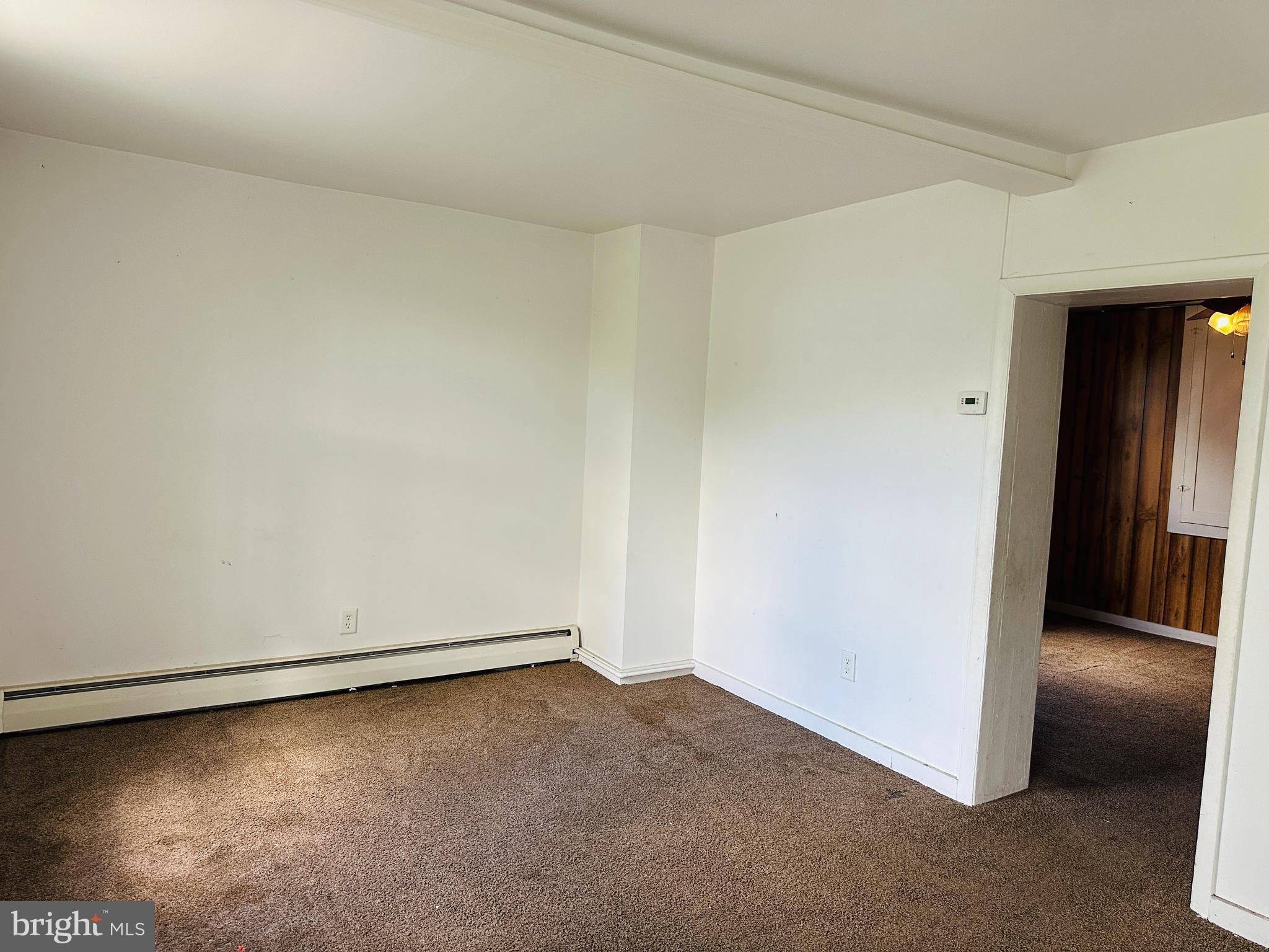 3666 Orrstown Road Orrstown, PA 17244 - Photo 7 of 11 an empty room with a bench