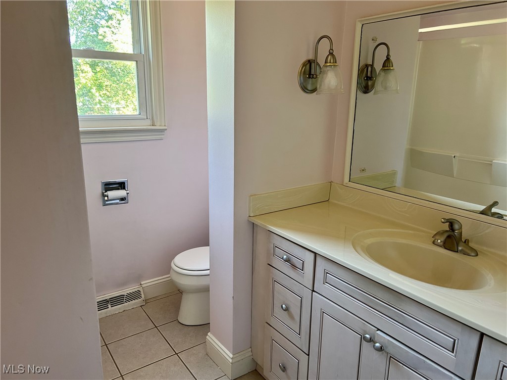 399 Abbyshire Road Green, OH 44319 - Photo 32 of 48 Bathroom featuring vanity and light ceramic tile floors