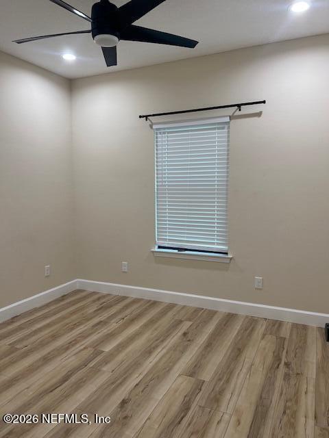 669 South Orange Street Starke, FL 32091 - Photo 2 of 12 en empty room with windows
